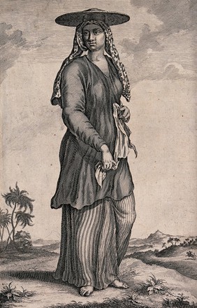 A woman slave in Bali, standing with a cloth in her hands and a wide hat on her head. Engraving after C. de Bruyn.