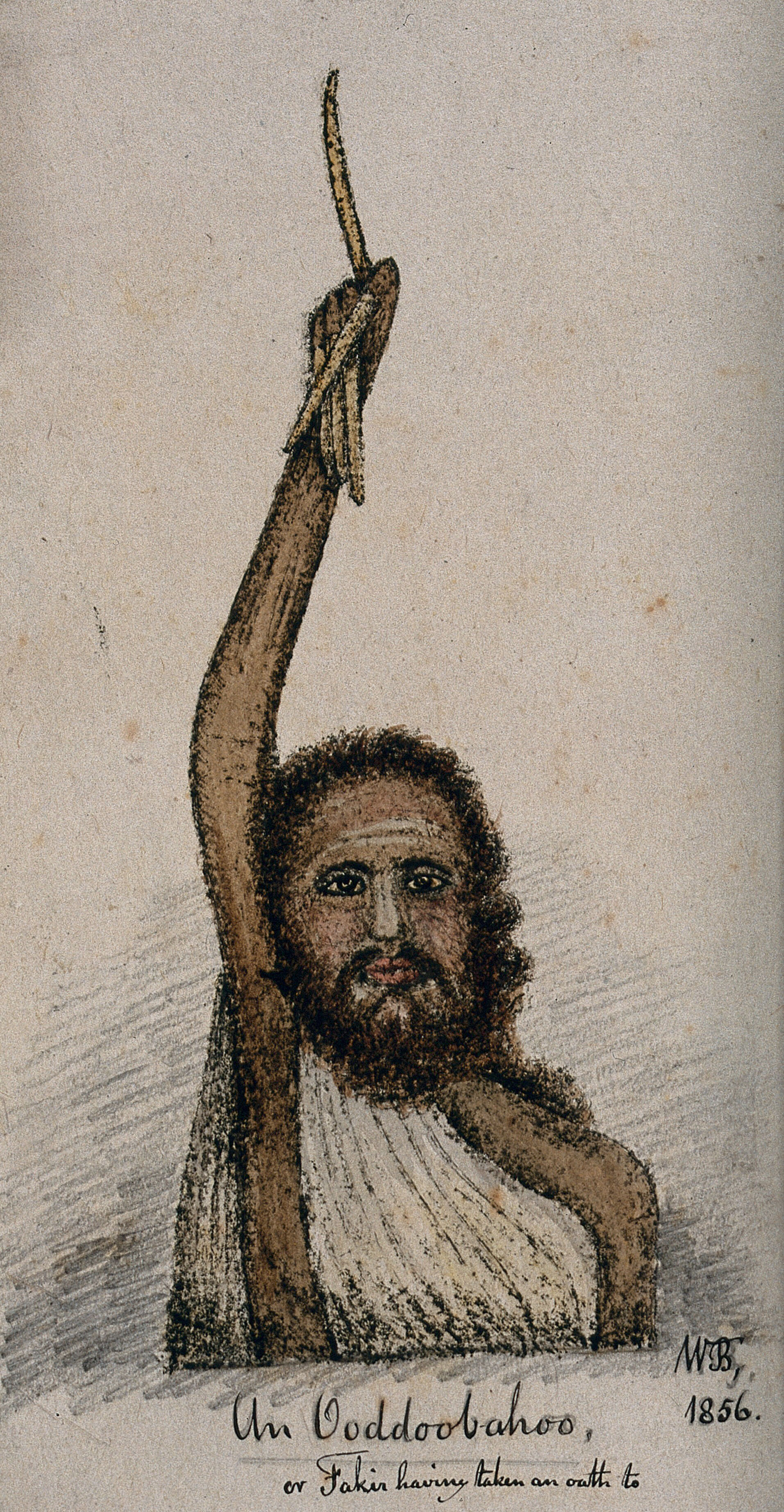 An Indian sadhu with very long fingernails is holding his 