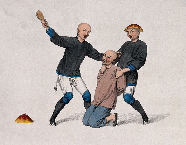 A Chinese man kneeling on the ground and held by a man in uniform is being hit by a man wearing a similar uniform. Coloured stipple print by J. Dadley, 1801.