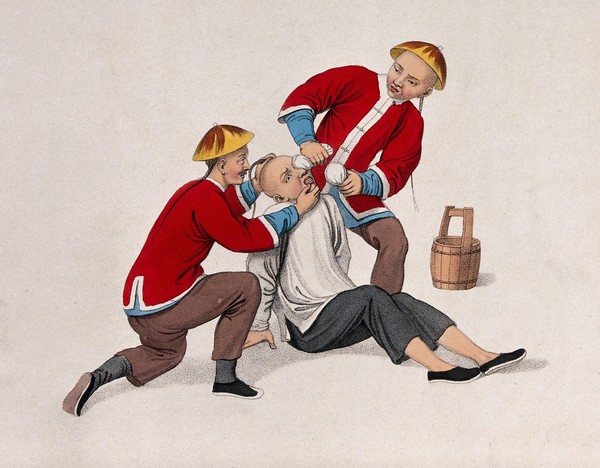A Chinese man is held on the ground by a man while another is burning his eyes with lime. Coloured stipple print by J. Dadley, 1801.