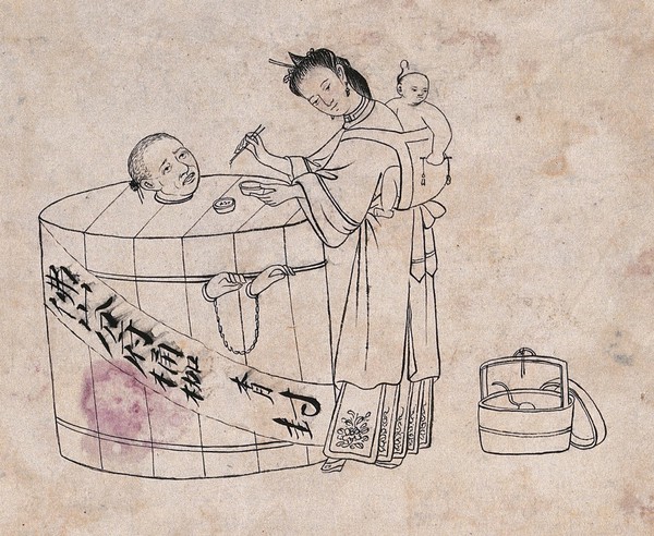 A Chinese woman carrying a baby on her back is feeding her husband who is imprisoned in a circular pillory. Engraving (?), ca. 1860.