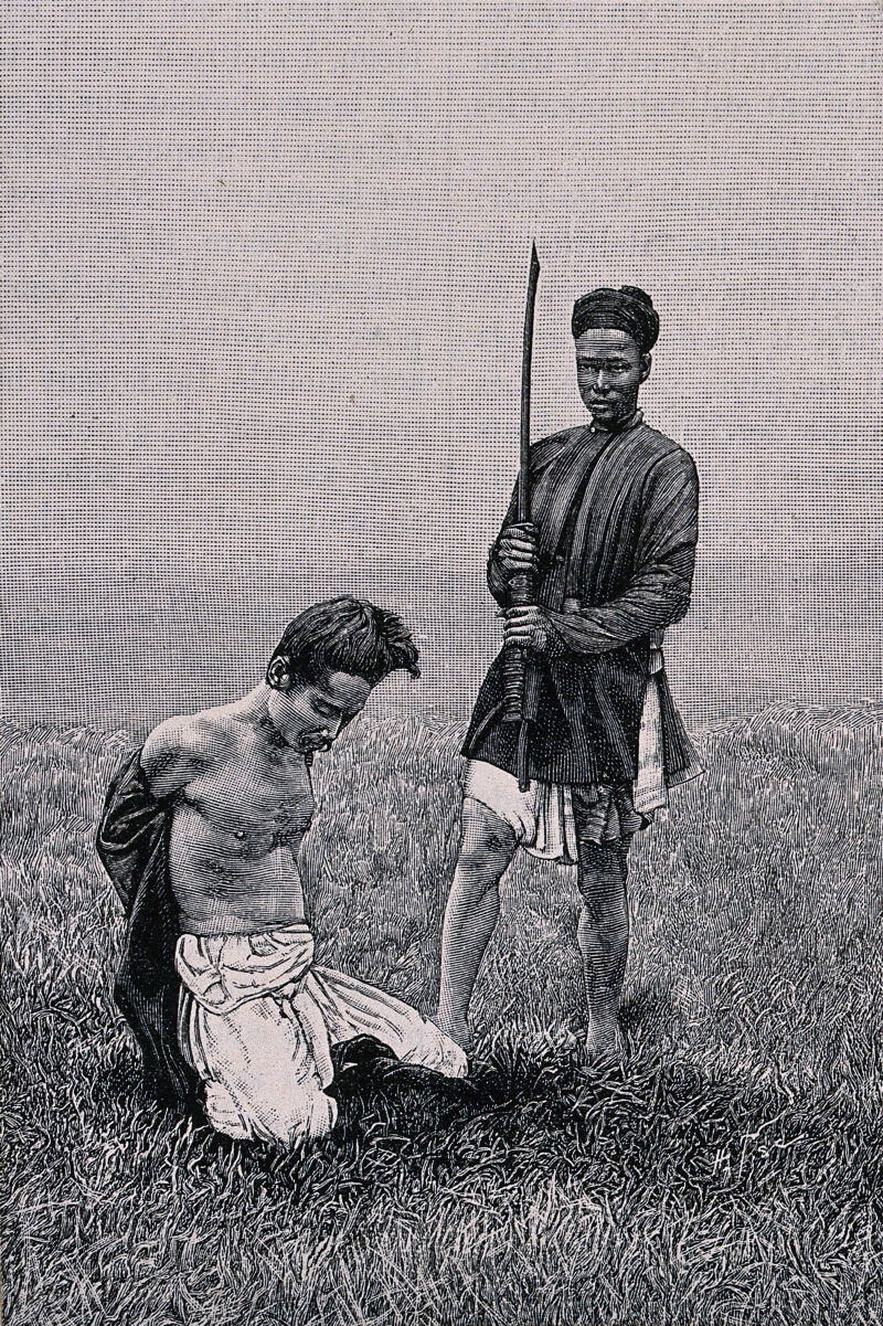 Vietnam: a man kneeling on the ground, about to be executed; man holding a sword standing next to him. Wood engraving by H. Thiriat, 1889, after C.E. Hocquard, ca. 1885., 1890, by Charles-Édouard Hocquard
