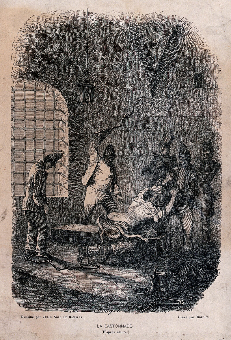 A manacled prisoner is stripped to the waist and restrained by prison warders while he is beaten with a lash. Wood engraving by F. Rouget after J. Noel and Rambert., by Jules Achille Noël