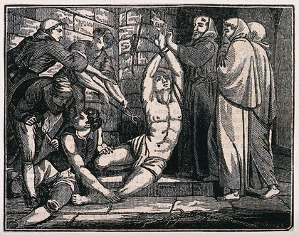 A man in a loincloth is tied to a wall by his wrists having his flesh pierced with pliers while three monks look on. Wood engraving by Walker.