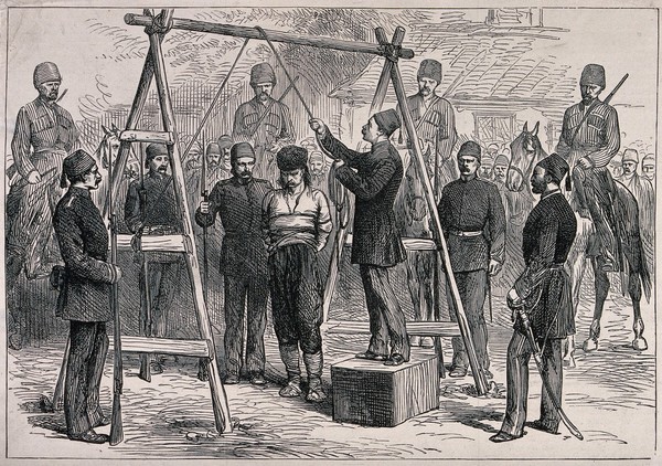 Execution of Bulgarians on makeshift gallows in the streets of Adrianople, Turkey. Wood engraving.