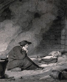 A man sits on the ground next to a dying man. Engraving.