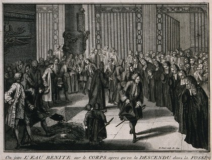 A funeral in a French church: the coffin is sprayed with holy water and lowered into the grounds of the church. Etching by B. Picart, 1724.