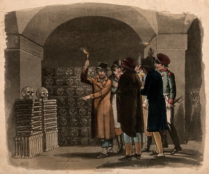 Gentlemen carrying torches visiting catacombs in Paris. Coloured aquatint by R.B. Peake.