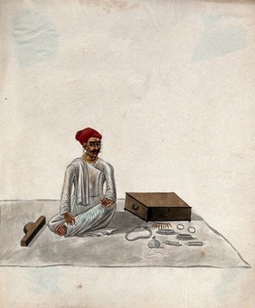 A jeweller displaying samples of his jewellery. Gouache painting by an Indian artist.