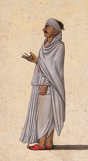 view A man holding a ink pot, two pens and a book in his hands. Gouache painting by an Indian artist.