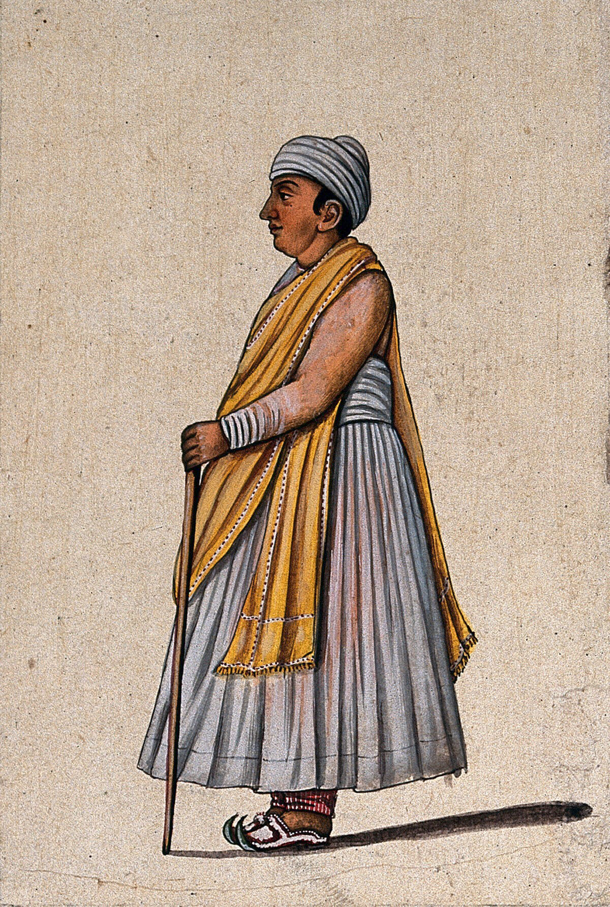 A Lucknow Courtier Holding A Walking Stick Gouache Painting By An