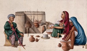 view A high ranking man sitting in front of a couple preparing chappatis (bread) and the woman nursing her baby. Gouache painting by an Indian artist.