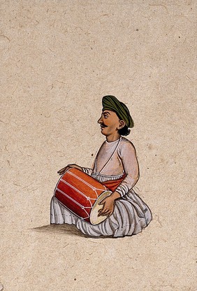 A musician from Lucknow playing the dholak (double-sided drum). Gouache painting by an Indian artist.