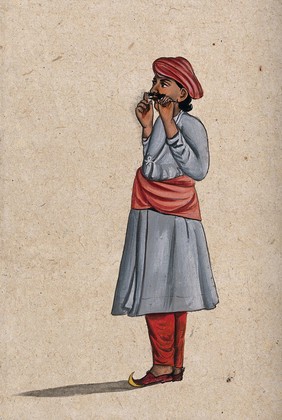 An Indian musician playing a nose flute. Gouache painting by an Indian artist.