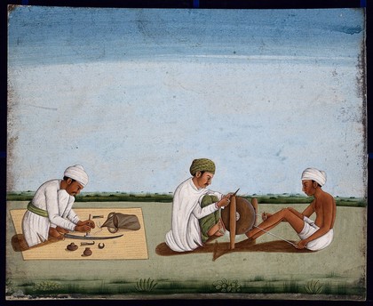 Two men sharpening a knife whilst the third prepares the blade on a sword. Watercolour by an Indian artist.