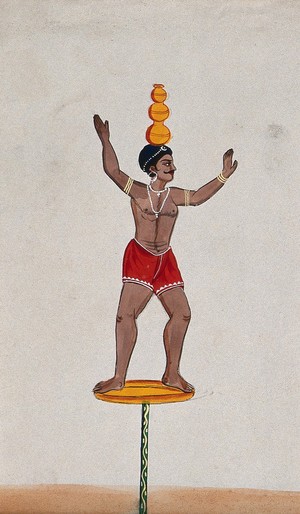 view A street performer standing on a disc balancing three pots on his head. Watercolour by an Indian artist.