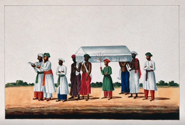 Four Muslims carrying a coffin for burial at the mosque preceded by two men reading from a holy book. Gouache painting by an Indian painter.