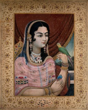 A Mughal courtesan or member of a Mughal royal family looking at a parrot perched on her hand. Gouache painting by an Indian painter.