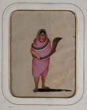 view A woman wearing a pink saree with a snake wrapped around her body. Gouache painting on mica by an Indian artist.