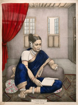 view A seated Indian woman looks at her pocket watch, with a book on her knee. Chromolithograph by an Indian artist,1800s.