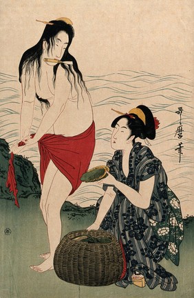 Two amas (women divers) on shore: one, who has just brought up a shellfish, holds a trowel in her teeth as she wrings out her skirt, while the other woman places the shellfish in a basket. Colour woodcut after Utamaro, 1900/1920 (?).