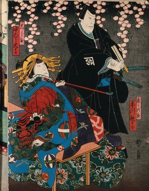 view Two actors as a man and a courtesan under a cherry blossom. Colour woodcut by Kunikazu, early 1860s.