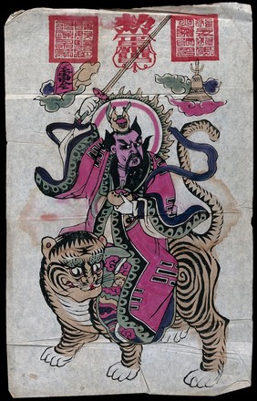 A Chinese warrior riding on a tiger. Hand tinted woodcut by a Chinese artist.
