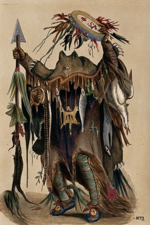 view A Blackfoot Indian medicine man. Coloured photograph, ca. 1913.