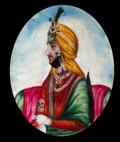 Maharajah Nounehatsingh (?) seated, wearing a richly decorated costume. Gouache painting.