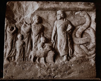 Aesculapius, the Greek god of healing, receiving patients with the serpent at his side. Photograph, 19--, of a stone bas-relief.