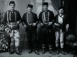 view Bulgarian men wearing national dress.