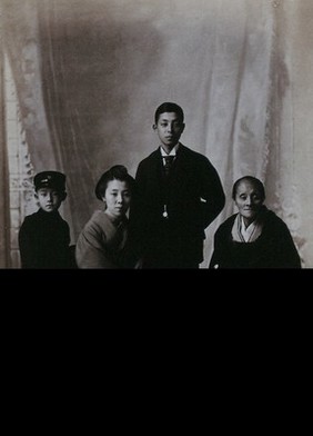 A family portrait in a photographic studio.