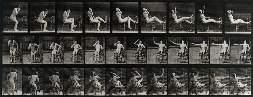 A woman sitting naked on a chair and smoking. Collotype after Eadweard Muybridge, 1887.