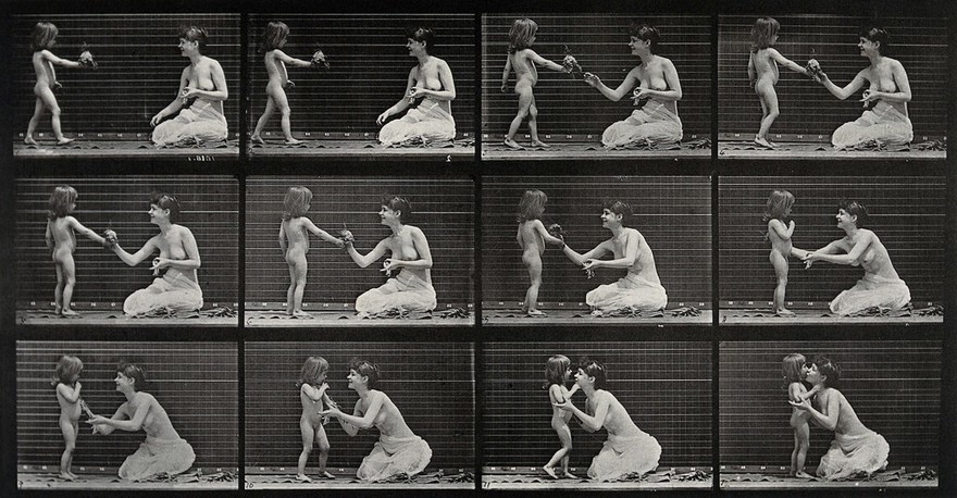 A woman being given a small bouquet by a little girl. Collotype after Eadweard Muybridge, 1887.