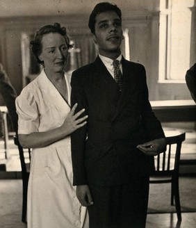 Spiritualist healing amongst the congregation of W.T. Parish: Mrs. Parish with a Sri Lankan patient. Photograph by Kurt Lubinski, ca. 1940.