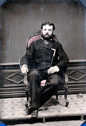 view Joseph Dawson seated in a chair: portrait in a studio in San Salvador, the Bahamas. Photograph, 1855/1865.