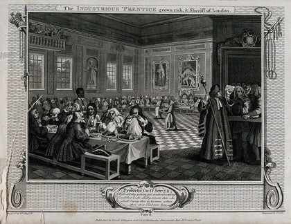 Francis Goodchild, now Sheriff of London, and his wife, framed by a sword and mace, preside over a grand banquet. Sitting at a table in the foreground various dignitaries gorge themselves contrasting with the poor petitioners waiting at the door. Engraving by Thomas Cook after William Hogarth, 1796.
