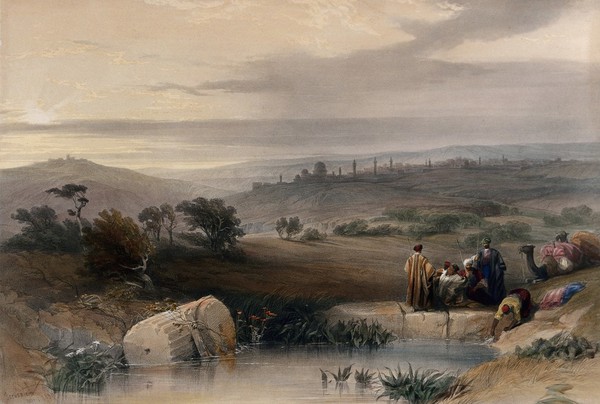 A distant view of Jerusalem; some people with camels resting by a pool. Coloured lithograph by Louis Haghe after David Roberts, 1842.