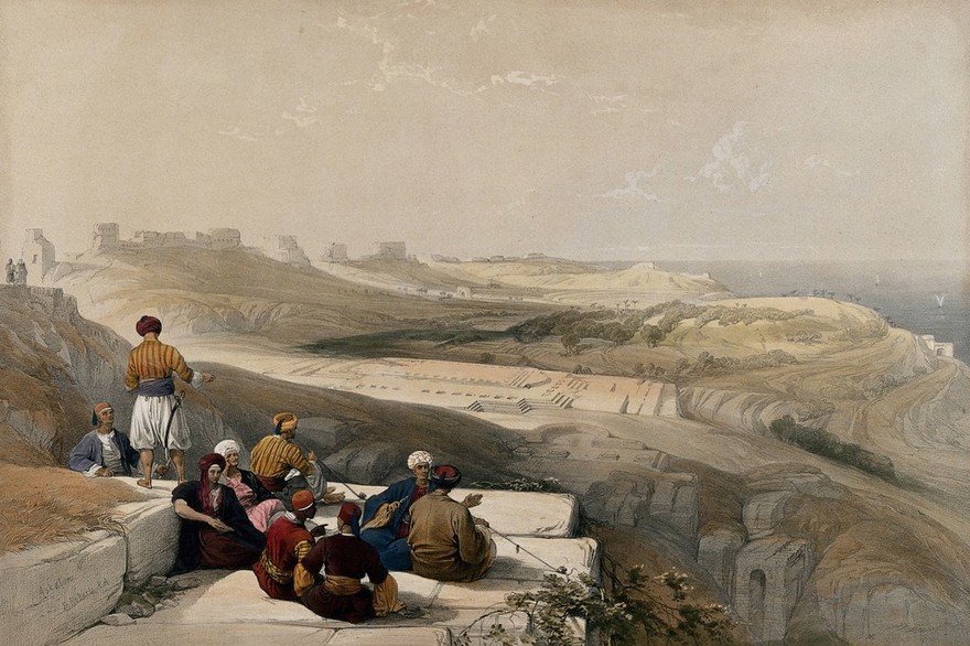 Men sitting to smoke with a panoramic view of the coast by Ashkelon, Israel. Coloured lithograph by L. Haghe, c. 1843, after D. Roberts.