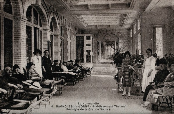 Bagnoles de l'Orne, France: patients reclining in a thermal establishment. Photographic postcard, ca. 1920.