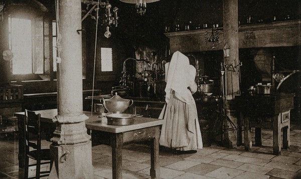 Beaunes, France: the kitchen at the Hôtel Dieu. Photographic postcard, ca. 1930.