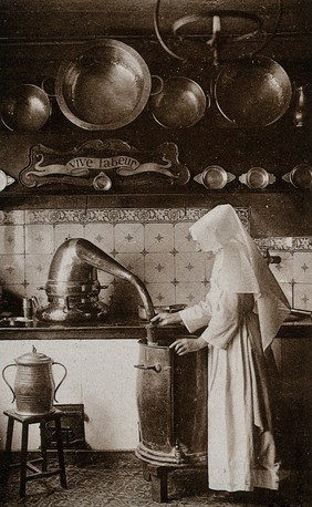 Beaunes, France: a nurse in the laboratory of the Hôtel Dieu. Photographic postcard, ca. 1930.