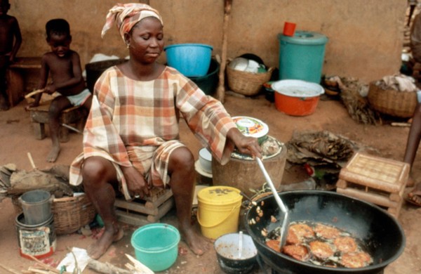 Woman cooking food, Nigeria