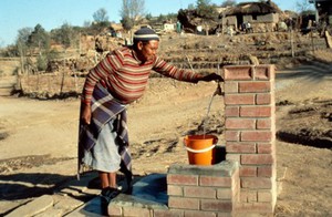 view Collecting water from an improved water source