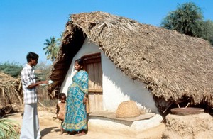 view Health worker is talking to a pregnant woman, India