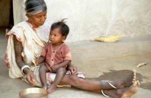 view Grandmother feeding child
