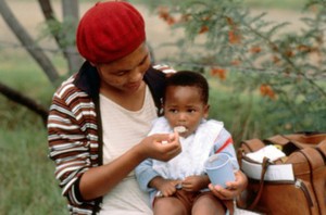 view Complementary feeding: mother feeding child