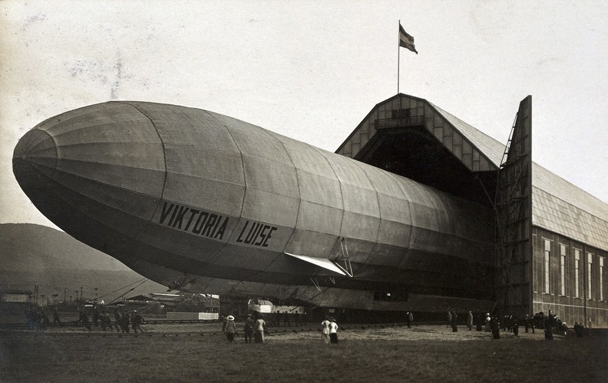 World War One: the zeppelin Viktoria Luise emerging from its hangar. Photograph, 1912/1915.