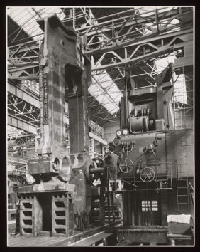 Machine shop, Davy & United Engineering Co. Ltd., Park Iron Works, Sheffield: a man is shown operating heavy machinery. Photograph, 1957.