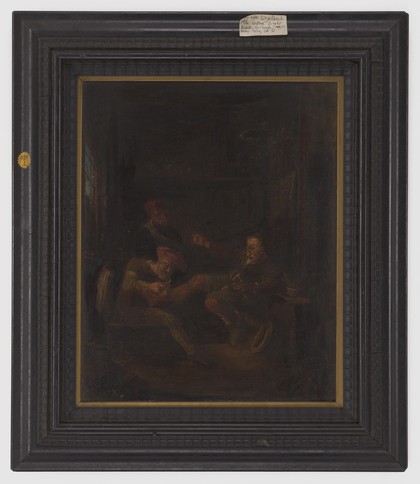 A surgeon treating a man's foot. Oil painting after a composition ascribed to Johannes Lingelbach.